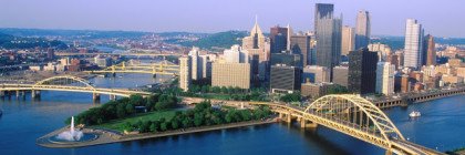 Liberty Bridge over Allegheny River at sunset with Pittsburgh skyline